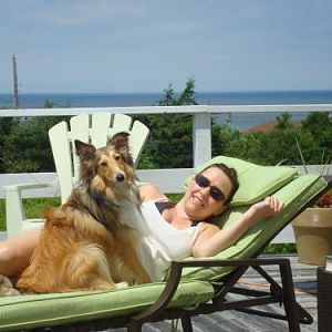 Toffee hanging out at a friend's cottage, schmoozing with his "Aunt Rachel" who's one of my best friends and his babysitter! lol