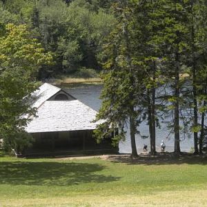 The boathouse with a doggie beach by the pond.  There must have been at least 10 dogs here enjoying the water!