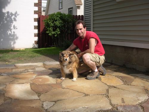 Helping clean off the patio