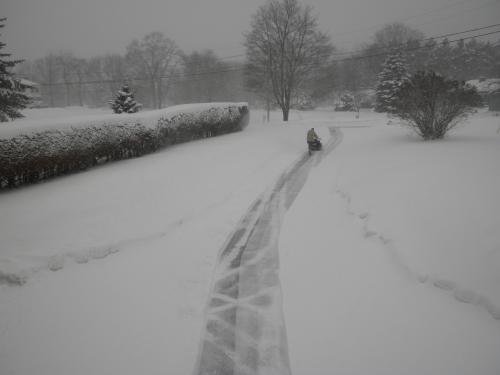 Jim snowblowing up the driveway